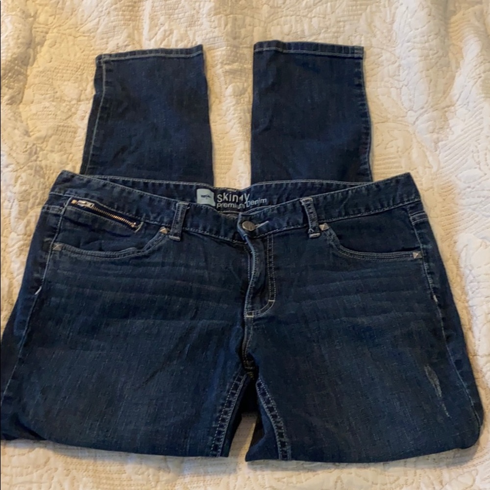 Skinny studded dark wash jeans. EUC